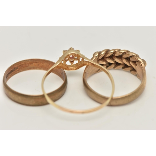 14 - THREE RINGS, the first a yellow gold band ring with milgrain edge detail, approximate width 4.5mm, h... 