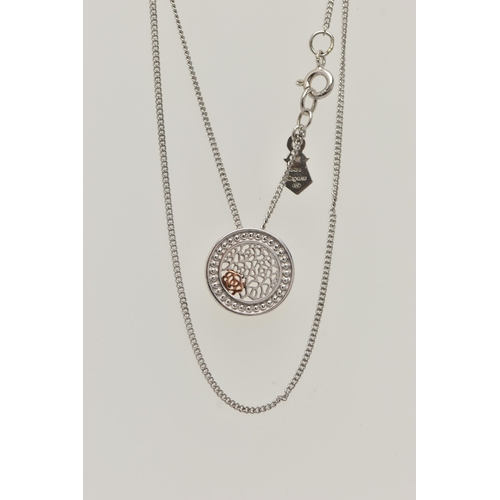 16 - A 'CLOGAU' ROYAL ROSES NECKLACE, designed as a silver open work disk with rose metal detail, suspend... 