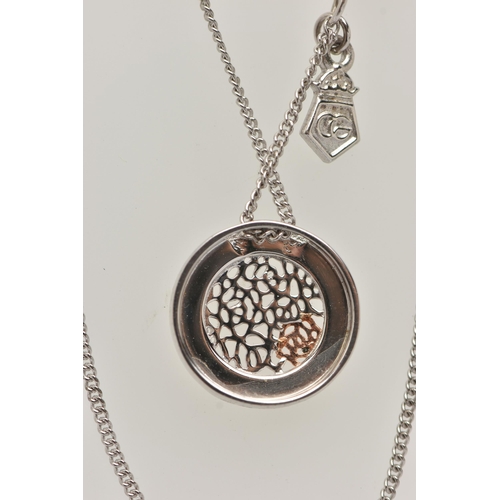 16 - A 'CLOGAU' ROYAL ROSES NECKLACE, designed as a silver open work disk with rose metal detail, suspend... 