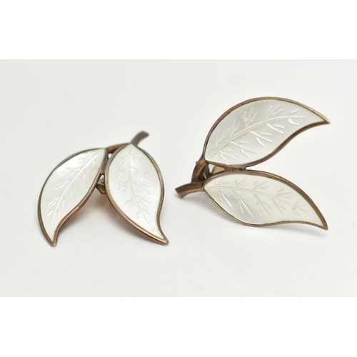 24 - A PAIR OF DAVID-ANDERSEN WHITE ENAMEL LEAF EARRINGS, each earring designed as two white guilloche en... 