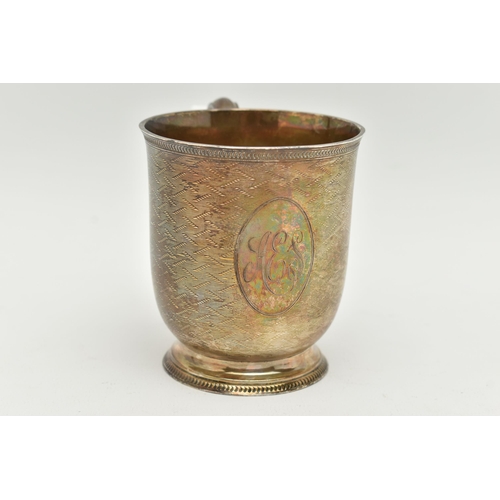 53 - A MID VICTORIAN SILVER CUP, engine turned pattern with engraved oval cartouche, fitted with a scroll... 