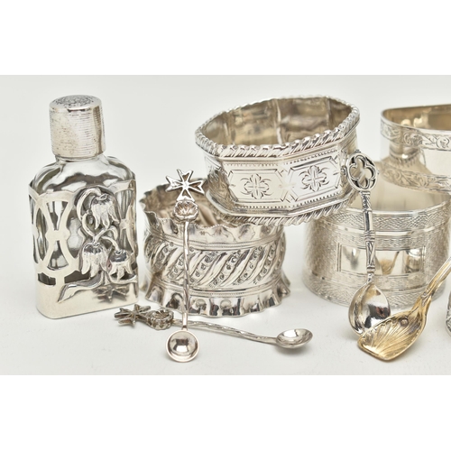 58 - A SELECTION OF SILVER ITEMS, to include five silver napkin rings, assorted with different designs, e... 