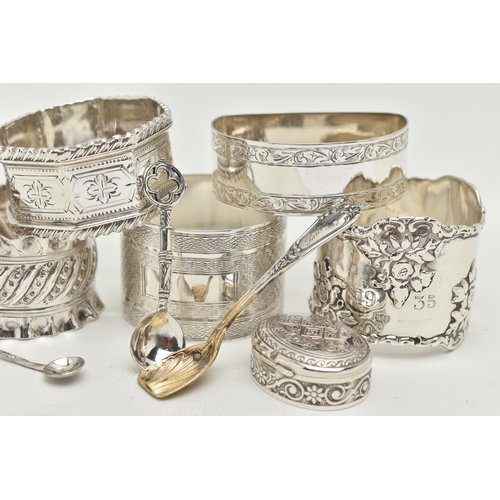 58 - A SELECTION OF SILVER ITEMS, to include five silver napkin rings, assorted with different designs, e... 