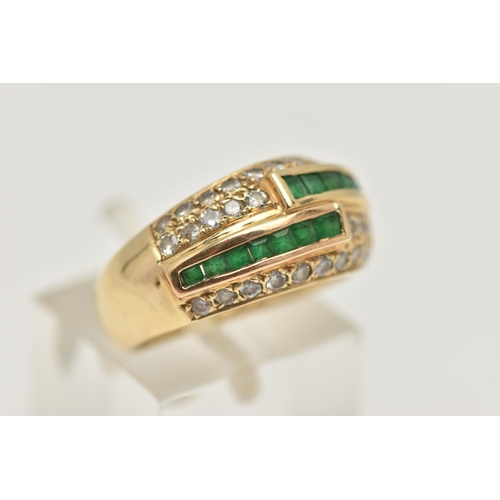 6 - A YELLOW METAL EMERALD AND DIAMOND RING, a domed ring, channel set with square cut emeralds and pave... 