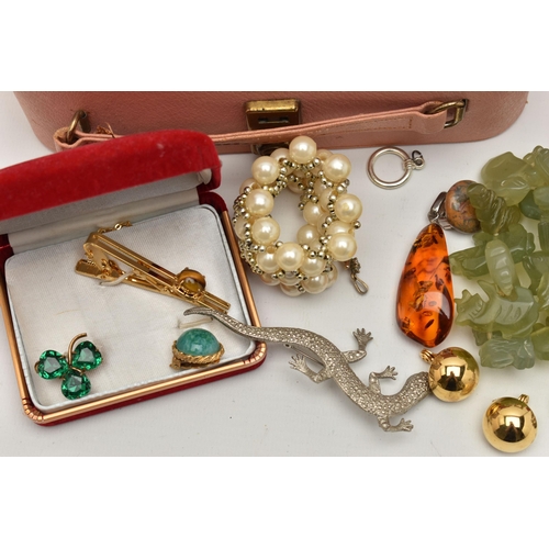 69 - A BOX OF ASSORTED JEWELLERY, to include a copal amber pendant, fitted with a white metal bail, a pai... 