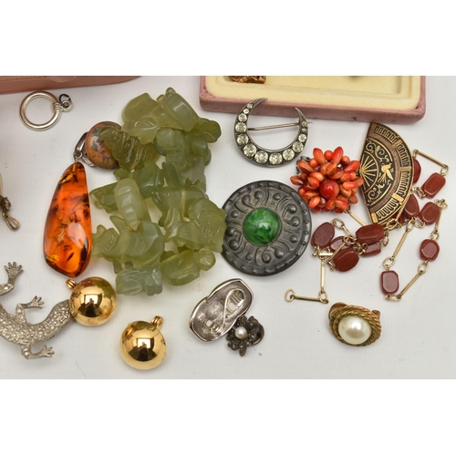 69 - A BOX OF ASSORTED JEWELLERY, to include a copal amber pendant, fitted with a white metal bail, a pai... 