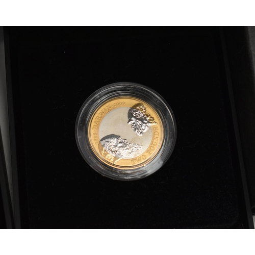 89 - A PLASTIC STORAGE TUB CONTAINING R.M. COINS, to include a 2009 KEW GARDENS Proof Year set, a 2008 Pr... 