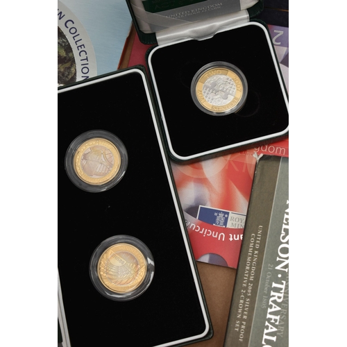 90 - A QUANTITY OF ROYAL MINT CASED BU AND PROOF COINS, to include Sixteen BU Year sets included is the D... 