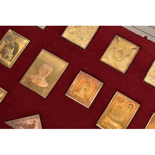 94 - CASED 'THE EMPIRE COLLECTION' GOLD PLATED SILVER REPLICAS, containing twenty five silver gilt stamps... 