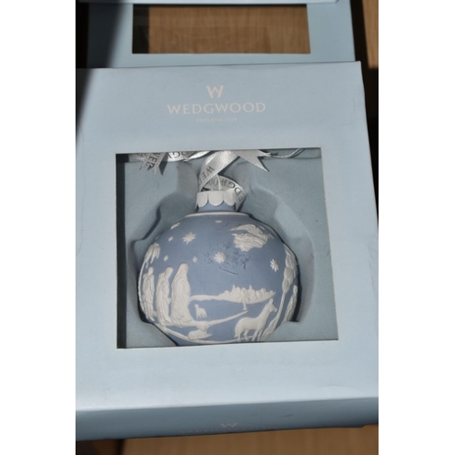 343 - A GROUP OF WEDGWOOD BLUE JASPERWARE, comprising two boxed Christmas baubles, a framed plaque and a v... 