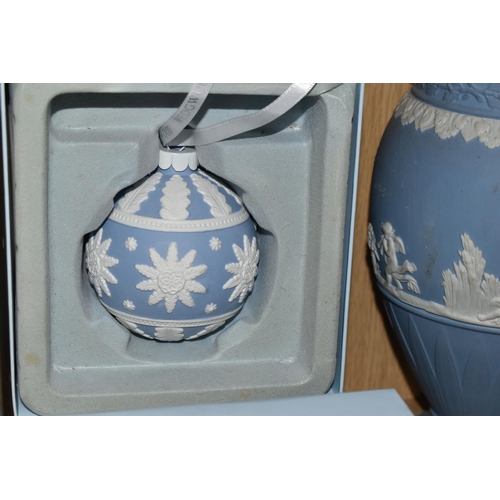 343 - A GROUP OF WEDGWOOD BLUE JASPERWARE, comprising two boxed Christmas baubles, a framed plaque and a v... 