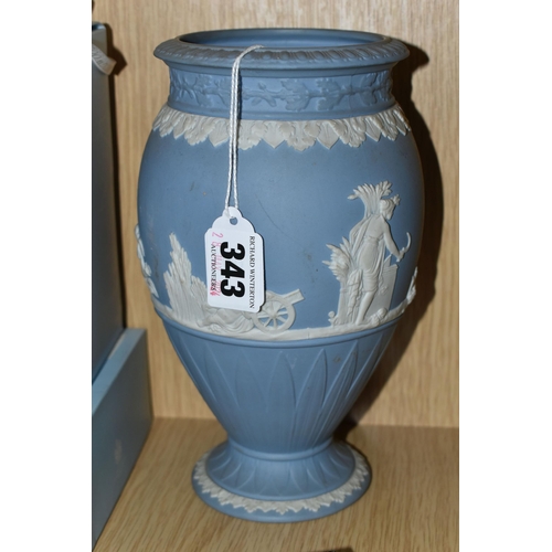 343 - A GROUP OF WEDGWOOD BLUE JASPERWARE, comprising two boxed Christmas baubles, a framed plaque and a v... 