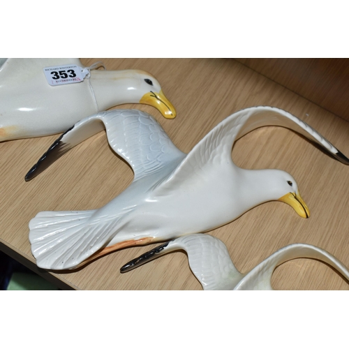 353 - A GROUP OF THREE GRADUATED BESWICK SEAGULLS, Style One- Wings Apart, white matt, designer Mr. Watkin... 