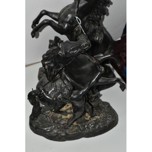 372 - A PAIR OF SPELTER MARLY HORSES, painted black, in Mould Cousteau signature to base, height 39cm x wi... 