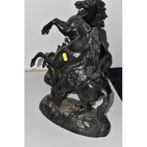 372 - A PAIR OF SPELTER MARLY HORSES, painted black, in Mould Cousteau signature to base, height 39cm x wi... 