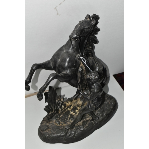 372 - A PAIR OF SPELTER MARLY HORSES, painted black, in Mould Cousteau signature to base, height 39cm x wi... 