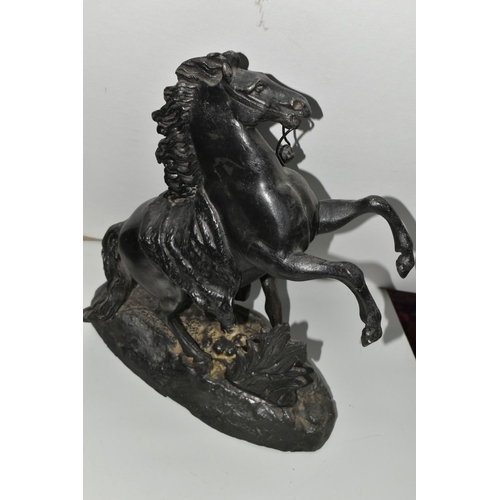 372 - A PAIR OF SPELTER MARLY HORSES, painted black, in Mould Cousteau signature to base, height 39cm x wi... 