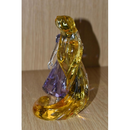 403 - A SWAROVSKI CRYSTAL 'RAPUNZEL' FIGURE, from Disney's Tangled, produced in 2018, model no 5301564, in... 