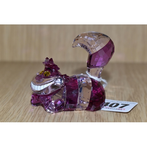 407 - A SWAROVSKI CRYSTAL 'CHESHIRE CAT' FIGURE, from Disney's Alice in Wonderland, produced in 2016-2018,... 