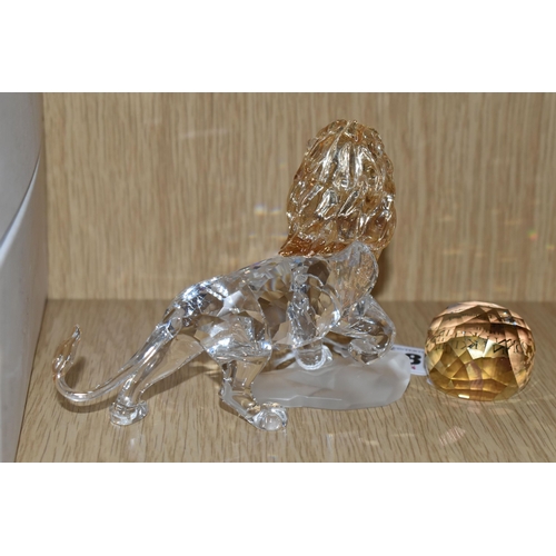 408 - A SWAROVSKI CRYSTAL 'MUFASA' FIGURE, from Disney's Lion King, produced in 2010-2011, model no 104826... 