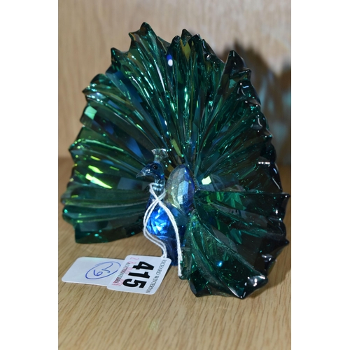 415 - A SWAROVSKI CRYSTAL 2015 ANNUAL EDITION 'ARYA PEACOCK' SCULPTURE AND PAPERWEIGHT, Arya Peacock was a... 