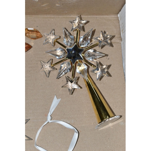 422 - A BOX OF SWAROVSKI CRYSTAL CHRISTMAS ORNAMENTS, comprising a tree topper, 2009 Gold SCS, 2009 Little... 