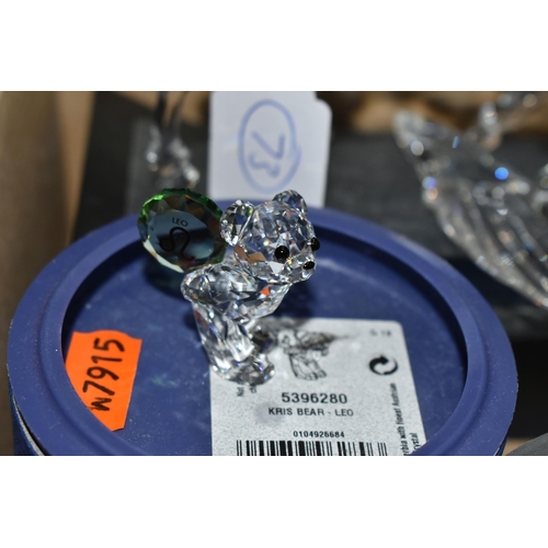 423 - A BOX OF SWAROVSKI CRYSTAL SCULPTURES, to include Pegasus (sd) and stand, a Loyalty Giraffe 2018, Bu... 