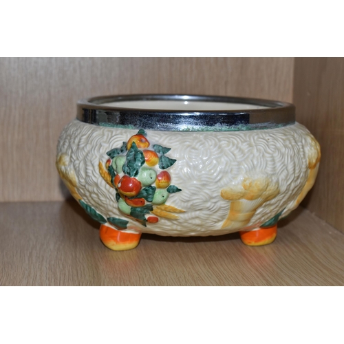 427 - A CLARICE CLIFF 'CELTIC HARVEST' FRUIT BOWL, moulded and painted with fruits and wheatsheaves on a t... 