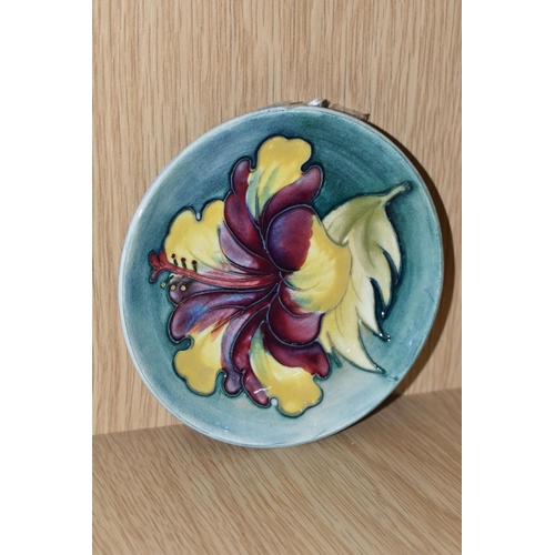 431 - A MOORCROFT POTTERY 'HIBISCUS' PATTERN TRINKET DISH, tube lined with red, purple and yellow hibiscus... 