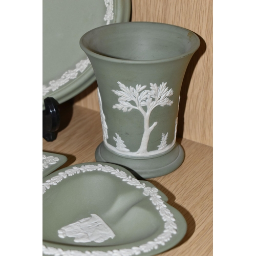 432 - FIVE PIECES OF SAGE GREEN WEDGWOOD JASPERWARE, comprising a covered pot, an oval tray, a vase height... 