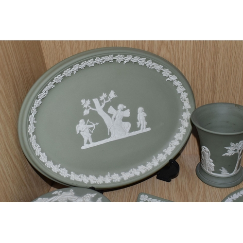 432 - FIVE PIECES OF SAGE GREEN WEDGWOOD JASPERWARE, comprising a covered pot, an oval tray, a vase height... 