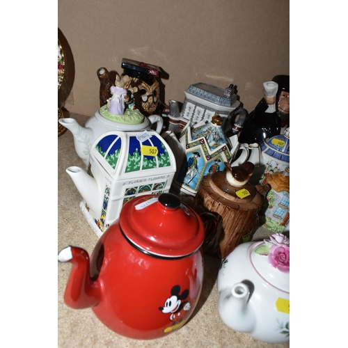 507 - A COLLECTION OF SEVENTEEN NOVELTY CERAMIC TEA POTS, including a Price Kensington Potteries black tax... 