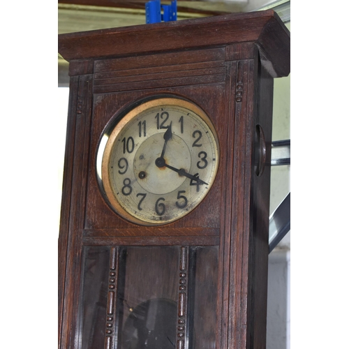 534 - THREE VINTAGE CLOCKS to include a 'Tempora' brass bulkhead clock from the early 20th century, a  wal... 