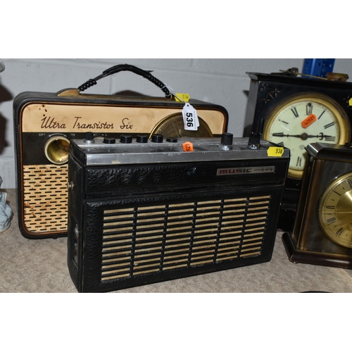 536 - A COLLECTION OF VINTAGE RADIOS, CLOCKS, AND A SET OF HEADPHONES to include a 'Grundig Party Boy 110'... 