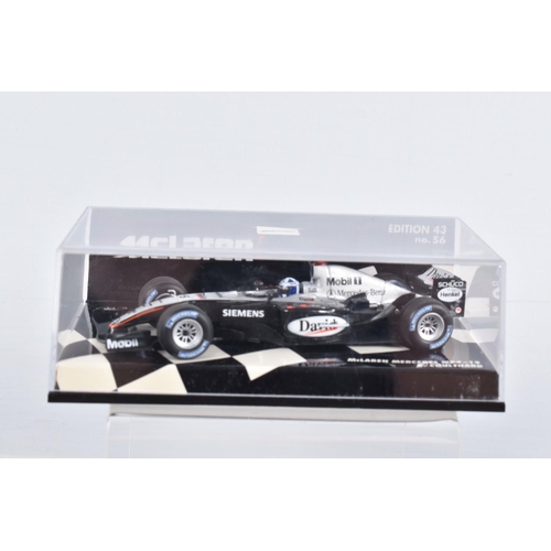 53 - FOUR BOXED MINICHAMPS RACING VEHICLES, to include a McLaren Mercedes MP4-19 D.Coulthard, edition 43 ... 