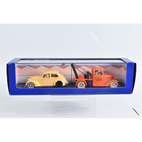 73 - FOUR BOXED HERGE MOULINSART EN VOITURE TINTIN MODELS, to include a Album Les Cigares du Pharaon L'av... 