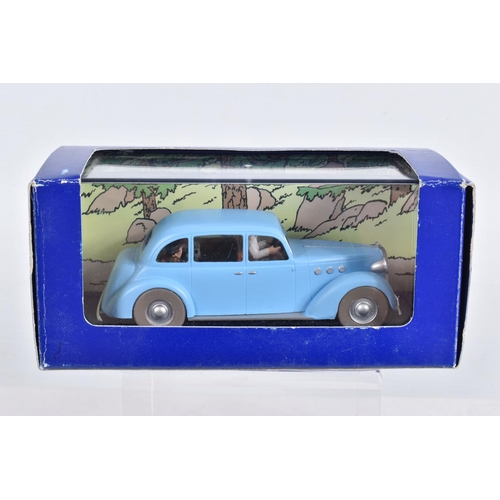 74 - SIX BOXED EN VOITURE TINTIN MODEL VEHICLES, the first is a La Jaguar Du Docteur Muller, de L'ile Noi... 