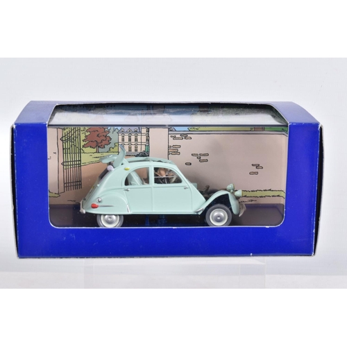 75 - SIX BOXED EN VOITURE TINTIN MODEL VEHICLES, the first a a box for a Taxi Van New Dehli Uit Kuifji in... 