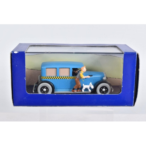 76 - SIX BOXED EN VOITURE TINTIN MODEL VEHICLES, the first is a Le Taxi De Tintin En Amerique, numbered 2... 