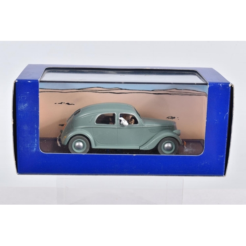 78 - SIX BOXED EN VOITURE TINTIN MODEL VEHICLES, the first is a Le Taxi Bleu de Lile Noire 1984, numbered... 