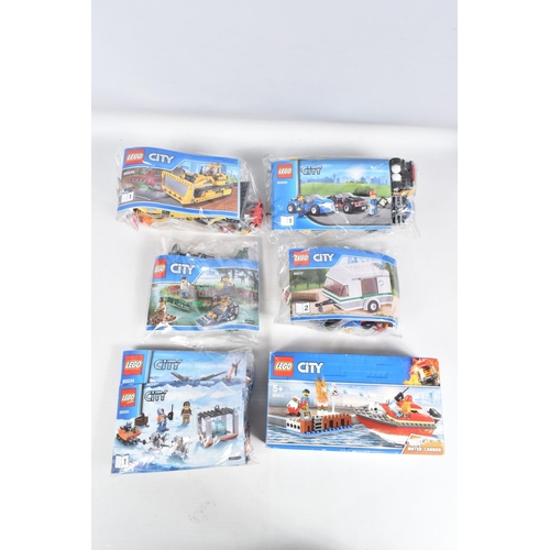 99 - A COLLECTION OF TWELVE UNBUILT LEGO SETS, to include a 60117 City Van & Caravan, a 60074 City Bulldo... 