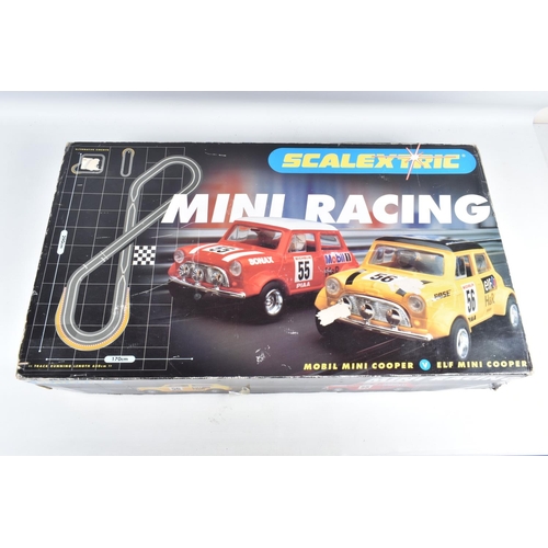 109 - TWO BOXED SCALEXTRIC SETS, Mini Racing, No.C.1019 and Calibra Cup, No.C.1045, both complete with car... 