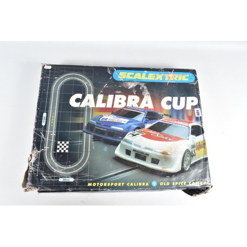 109 - TWO BOXED SCALEXTRIC SETS, Mini Racing, No.C.1019 and Calibra Cup, No.C.1045, both complete with car... 