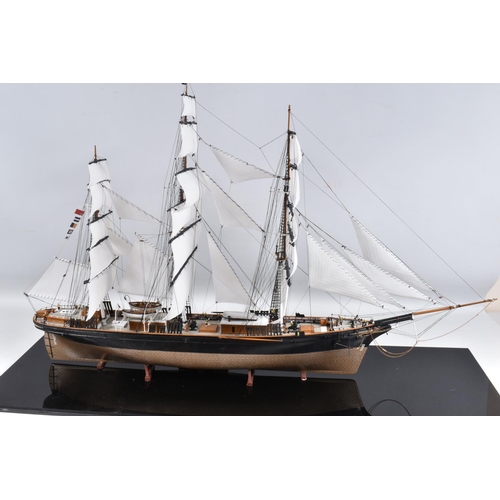 112 - A CONSTRUCTED REVELL PLASTIC KIT OF THE CUTTY SARK HOUSED IN A PERSPEX DISPLAY CASE, kit has been co... 