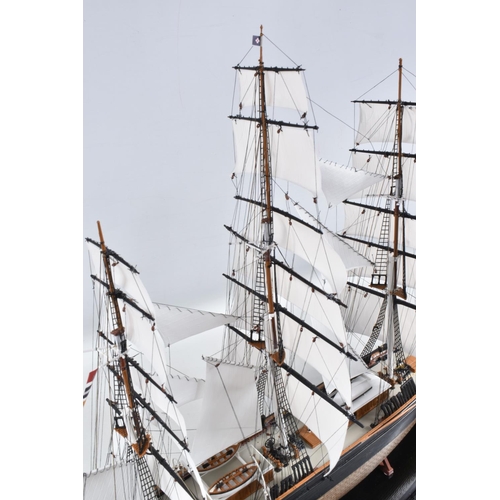 112 - A CONSTRUCTED REVELL PLASTIC KIT OF THE CUTTY SARK HOUSED IN A PERSPEX DISPLAY CASE, kit has been co... 