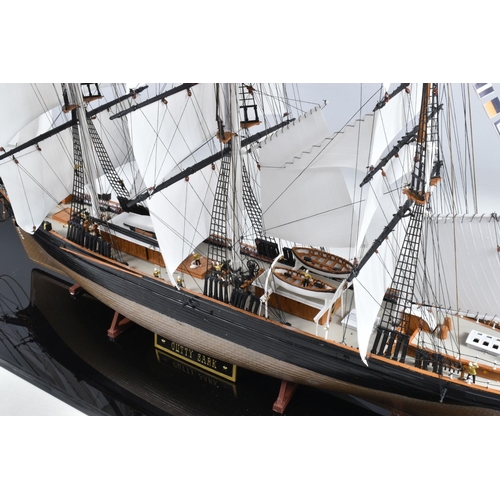 112 - A CONSTRUCTED REVELL PLASTIC KIT OF THE CUTTY SARK HOUSED IN A PERSPEX DISPLAY CASE, kit has been co... 