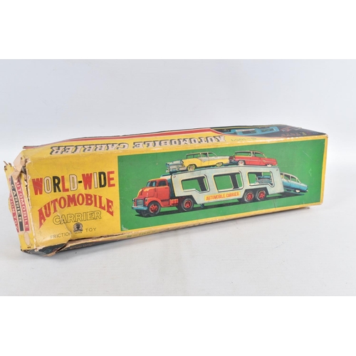 140 - A BOXED SSS INTERNATIONAL (JAPAN) TINPLATE FRICTION DRIVE ARTICULATED AUTOMOBILE CARRIER AND FOUR CA... 