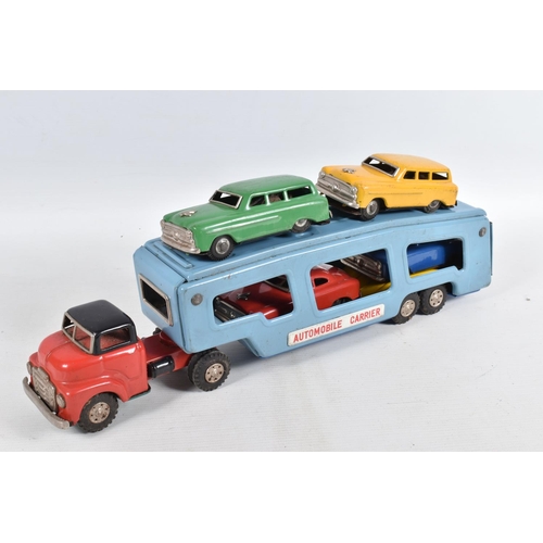 140 - A BOXED SSS INTERNATIONAL (JAPAN) TINPLATE FRICTION DRIVE ARTICULATED AUTOMOBILE CARRIER AND FOUR CA... 