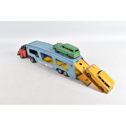 140 - A BOXED SSS INTERNATIONAL (JAPAN) TINPLATE FRICTION DRIVE ARTICULATED AUTOMOBILE CARRIER AND FOUR CA... 