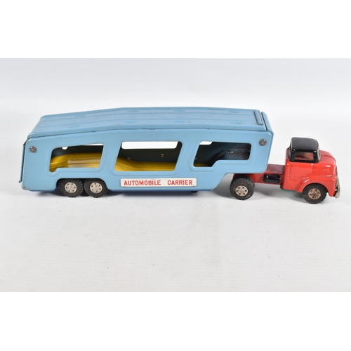 140 - A BOXED SSS INTERNATIONAL (JAPAN) TINPLATE FRICTION DRIVE ARTICULATED AUTOMOBILE CARRIER AND FOUR CA... 